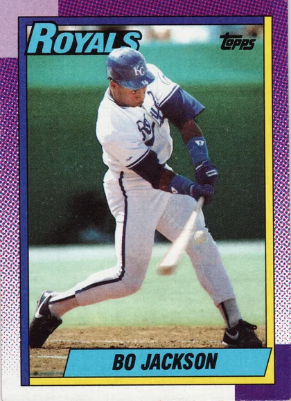 Front of 1990 Topps (The Topps Company, Inc.) 1990 Topps Baseball Bo Jackson #300 1990 Topps Bo Jackson #300, front of a baseball card showing a Kansas City Royals player in white home uniform with blue cap (KC logo) mid-throwing motion on the field. Blue…