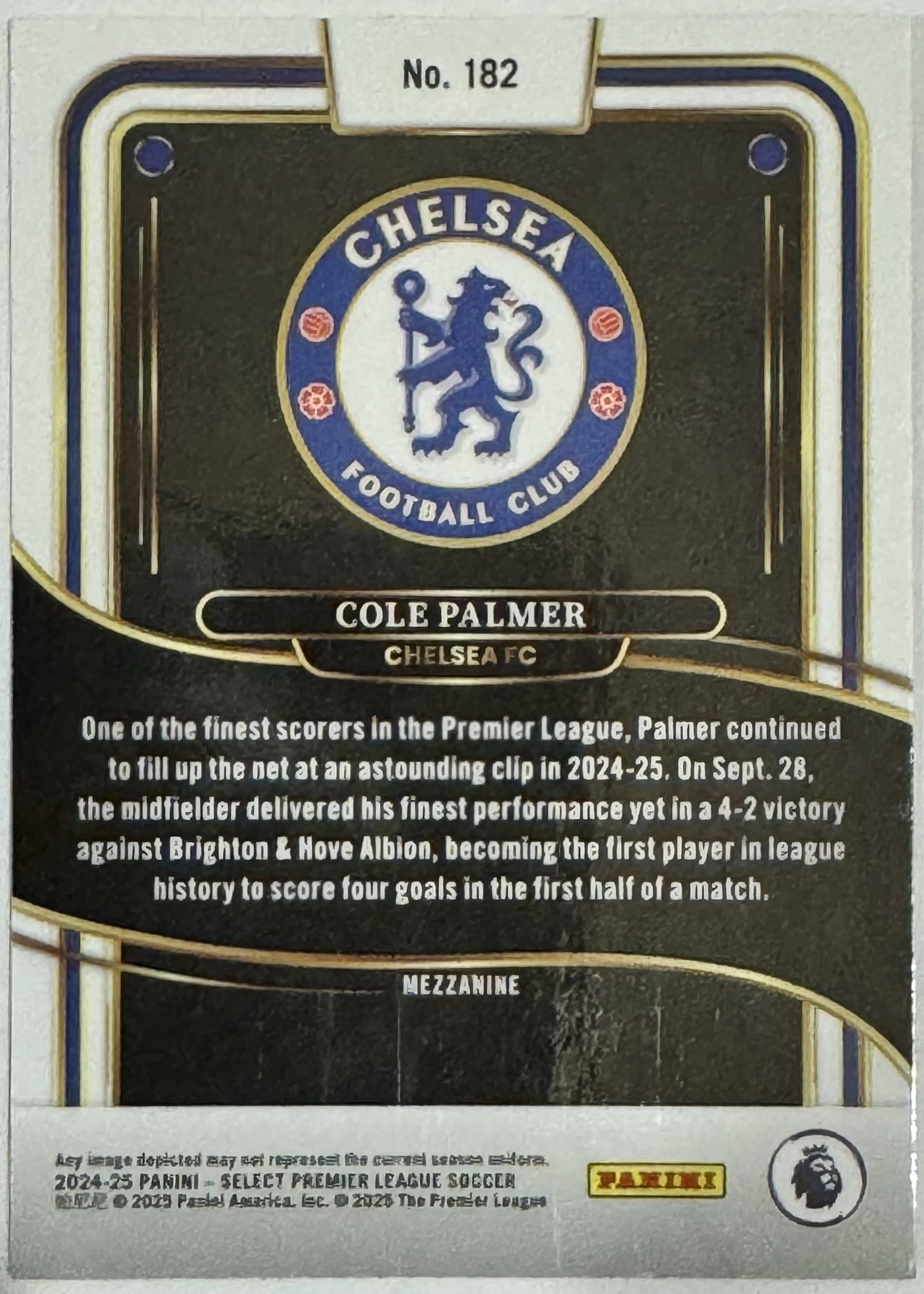 Back of 2024-25 Panini Select Premier League Soccer Cole Palmer #182 Mezzanine Ice Prizm, the back of a trading card features a dark, textured background with gold and blue Art Deco-style borders. At the top, a white tab displays 'No…