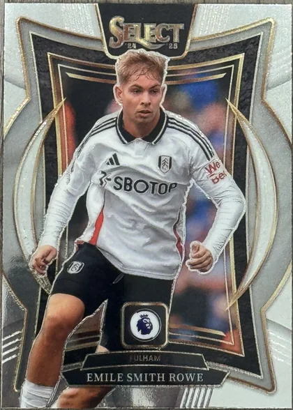 Front of 2024-25 Panini Select Premier League Soccer Emile Smith Rowe #No. 21 Terrace Silver, a soccer trading card featuring a player in a white Fulham jersey with black shorts, running. The card has a silver and gold border with a star-like…